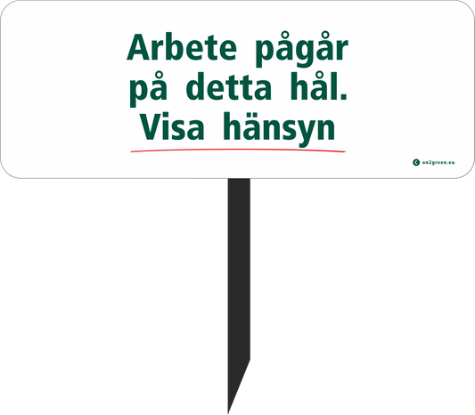 Golfskylt: Arbete pågår på detta hål. Visa händsyn